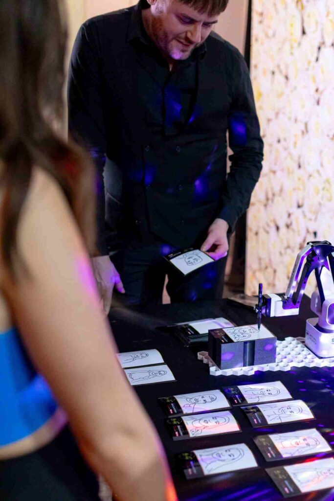 sketch bot www.bigday.events robotic arm cartoon images on the spot. corporate events